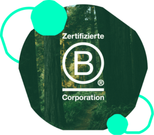 B Corp logo in front of trees