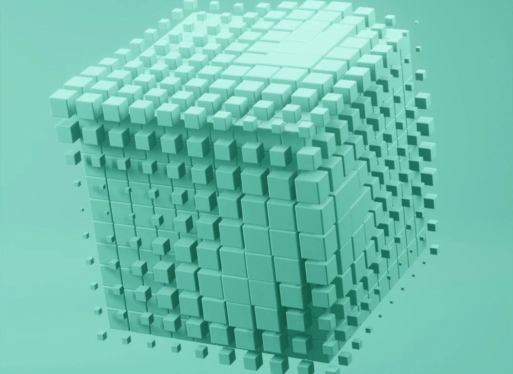 Titelbild des Blogbeitrags "Tokenisierung von Assets" - ein grüner Würfel, der aus vielen kleinen Würfeln zusammengesetzt ist
